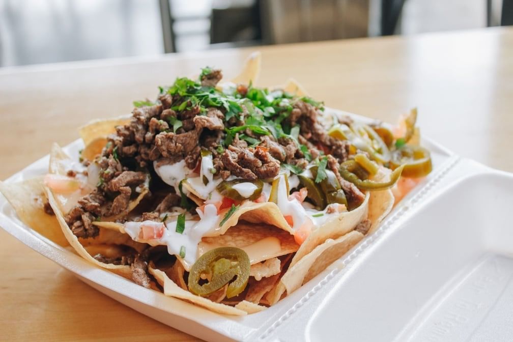 Nachos queso + meat.