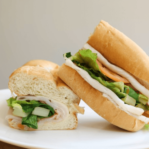 Turkey or Ham w/ Cheese Sub.