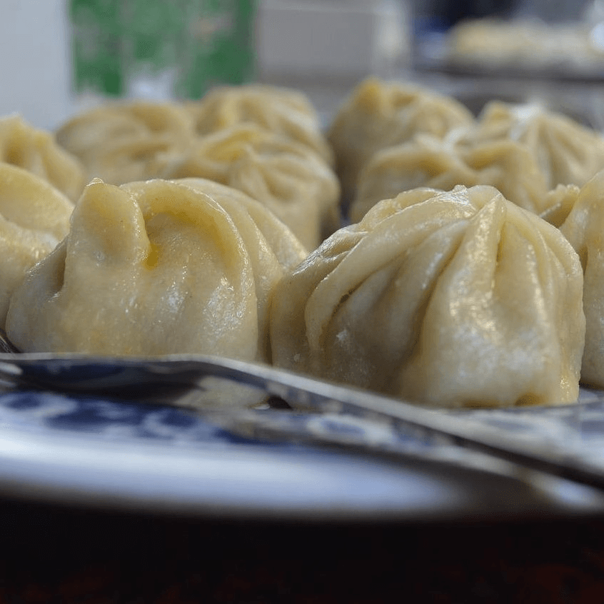 Veg jhol (soup) momo.