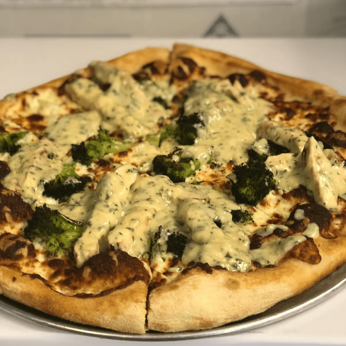 Chicken Broccoli Alfredo Pizza.