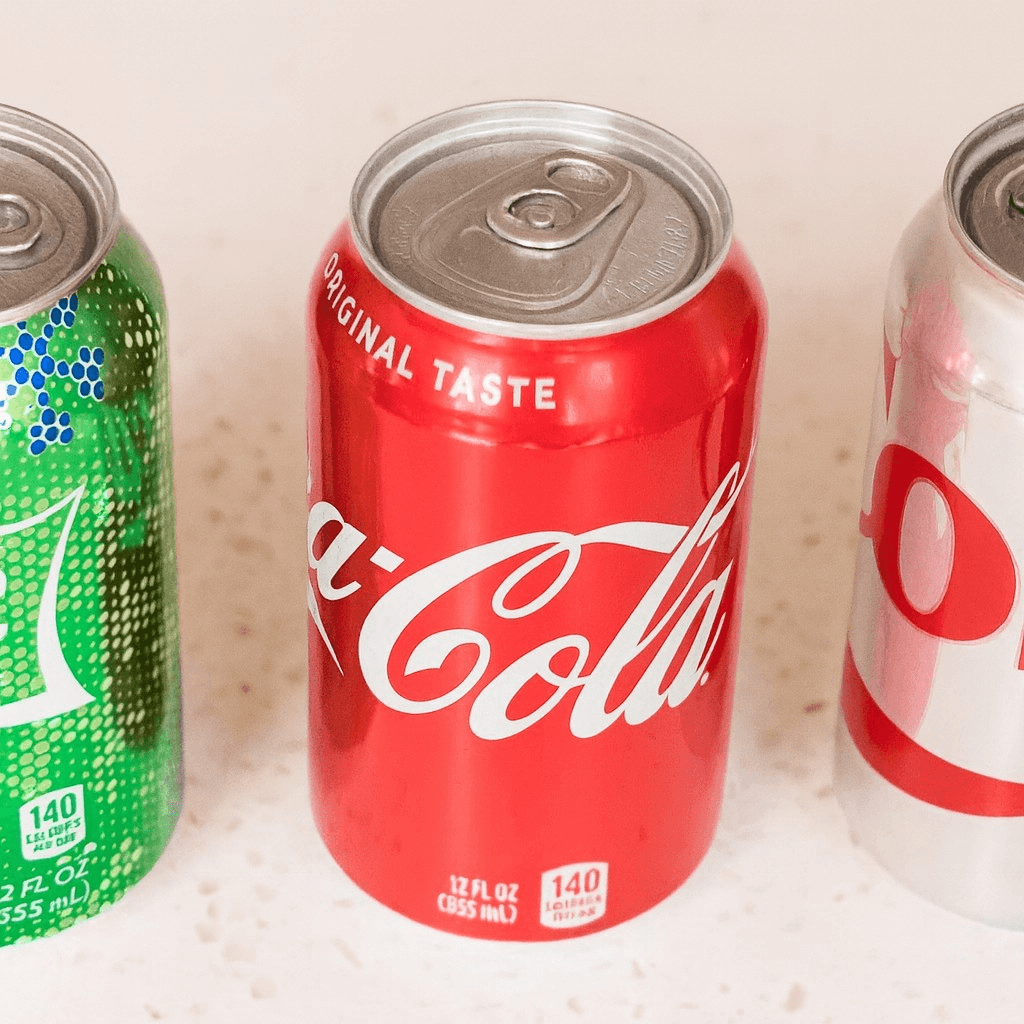 Assorted individual sodas.
