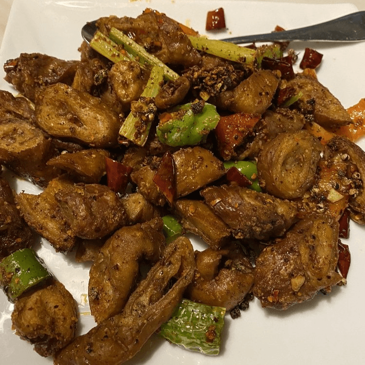 干煸肥肠 Dry Sauteed Pork Intestine with Dried Red Chili Peppers.