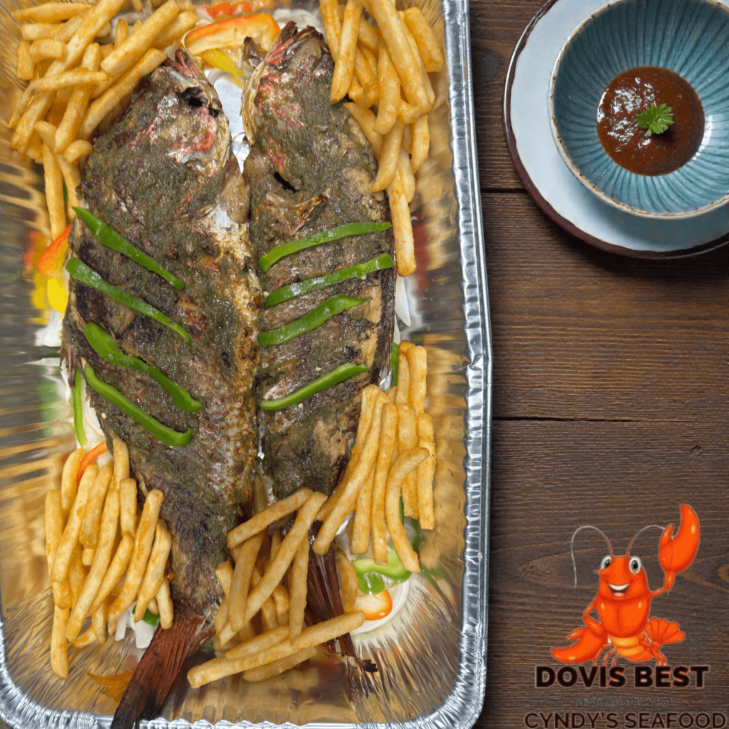 Grilled Red Snapper with Fried Plantains, French Fries or Jallof Rice.