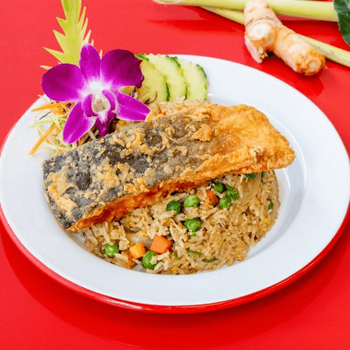 CRISPY SALMON WITH FRIED RICE.