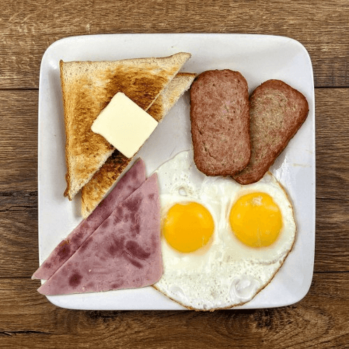 Choice of 2 Meats, 2 Eggs, Breakfast Potatoes and Toast