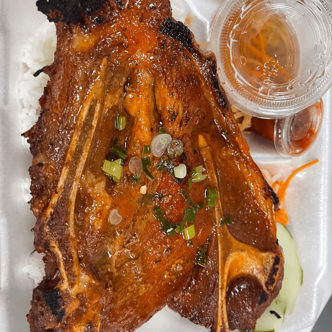 64. Cơm Tấm Thịt Nướng- Grilled Pork Chop.