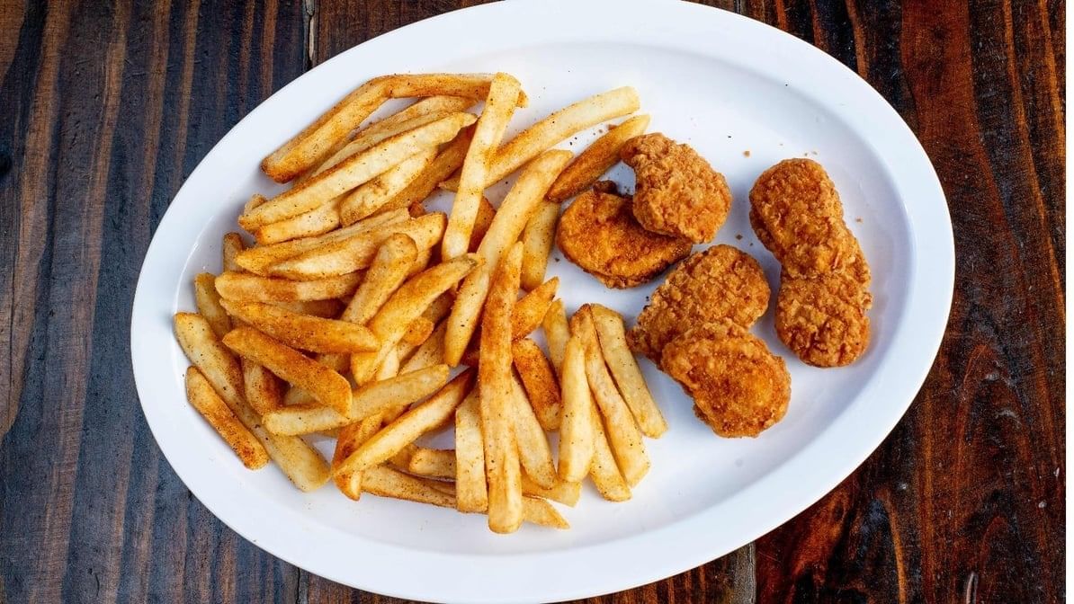 Six Pcs Chicken Nuggets with Fries.