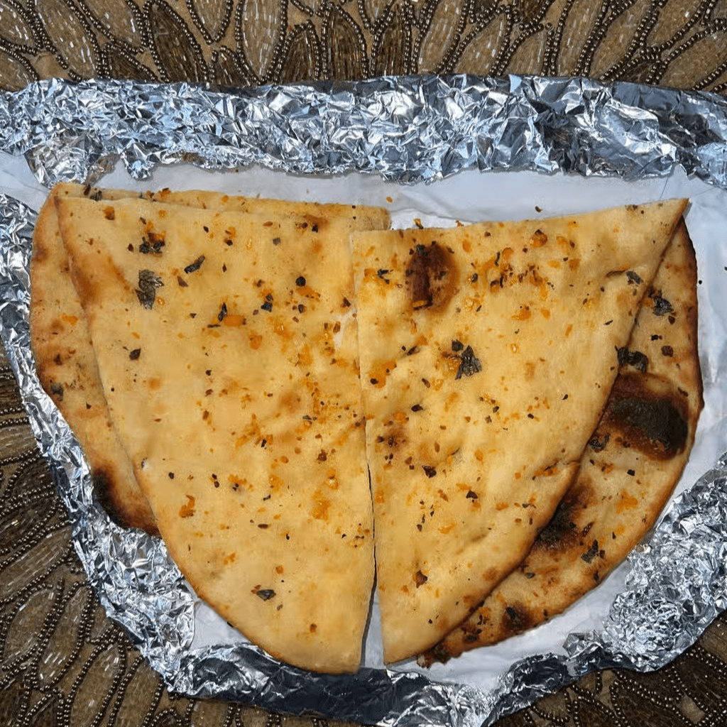 71. Garlic Naan.