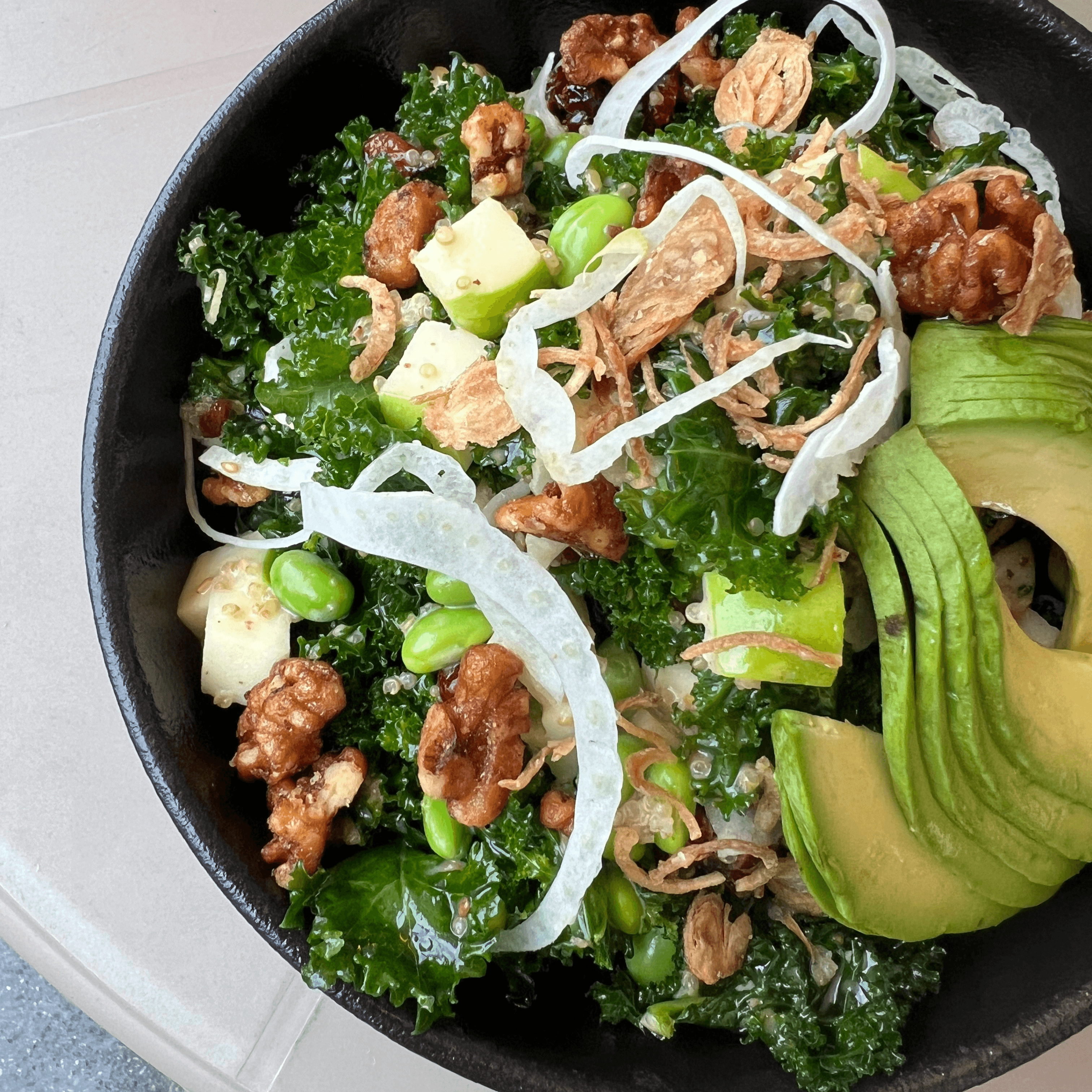 Kale salad with roasted sesame dressing.