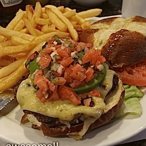  TexMex Burger, Pico de Gallo, Avocado and Pepper Jack Cheese on a Brioche Bun. TexMex Burger, Pico de Gallo, Avocado and Pepper Jack Cheese on a Brioche Bun.