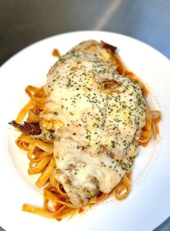 Grilled Chicken Parmesan with Tomato Sauce.