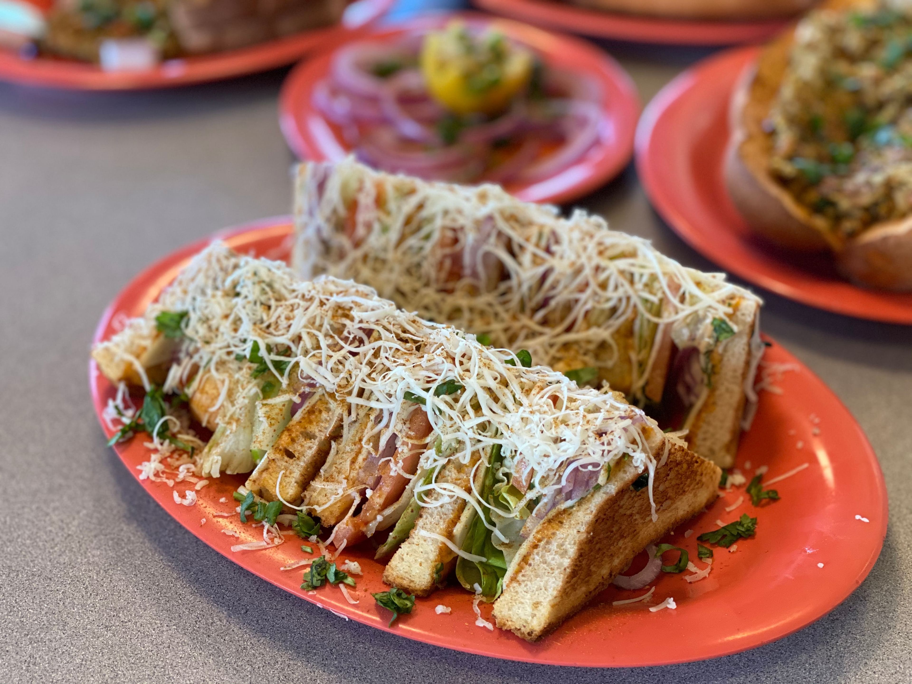 Veg Club Sandwich & Masala French Fries.