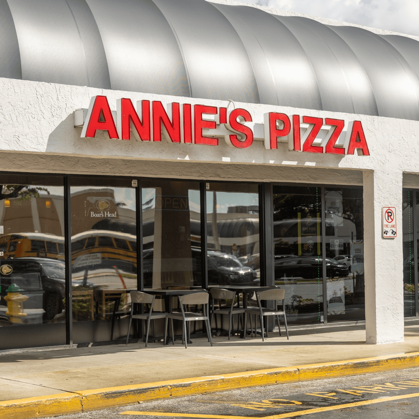 Visit Annie’s Pizza, Subs & Wings