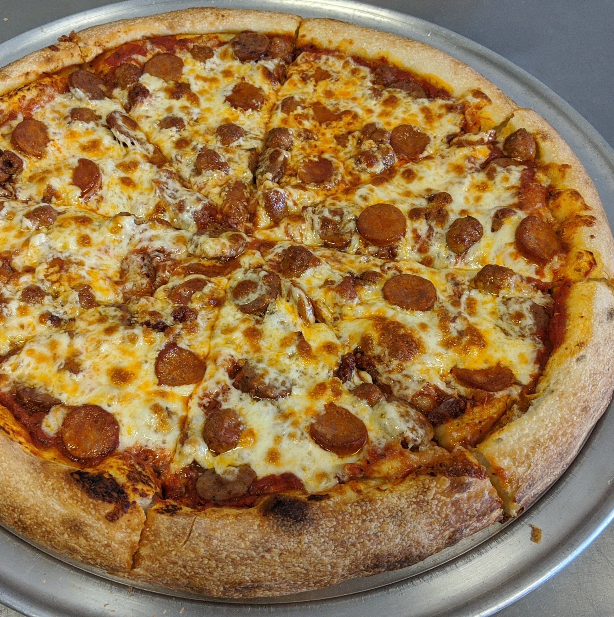 The Sausage Supreme Pizza.