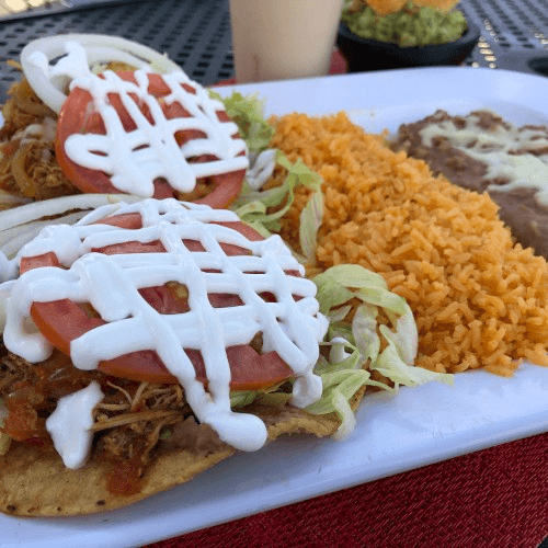 Two Tostadas with Meat & Side of Rice and Beans