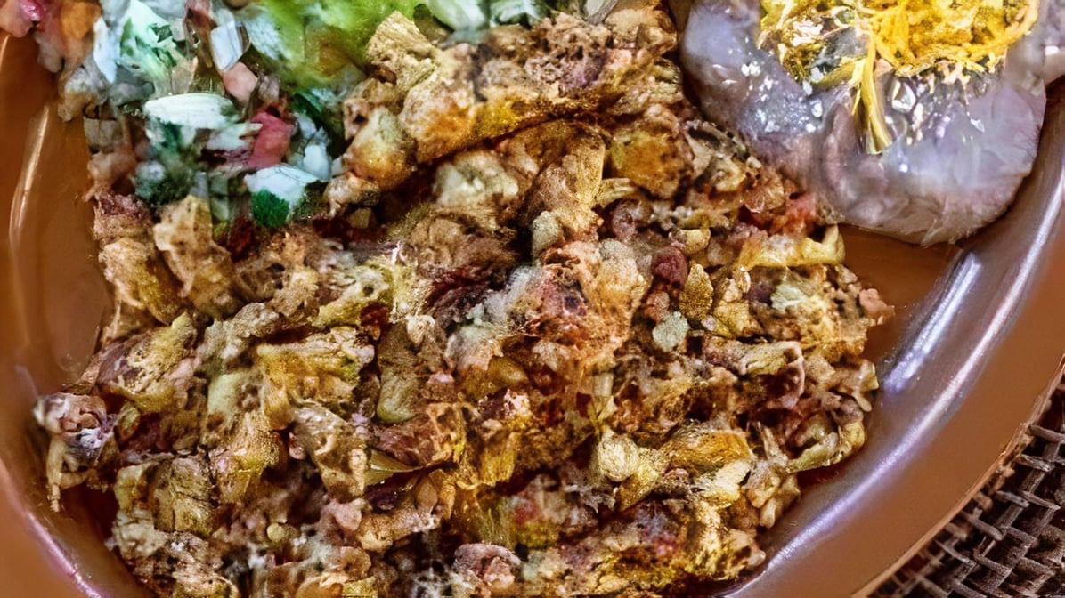 CHORIZO TORTA - BEANS, CHEESE, GUACAMOLE, LETTUCE, CHORIZO, EGGS.