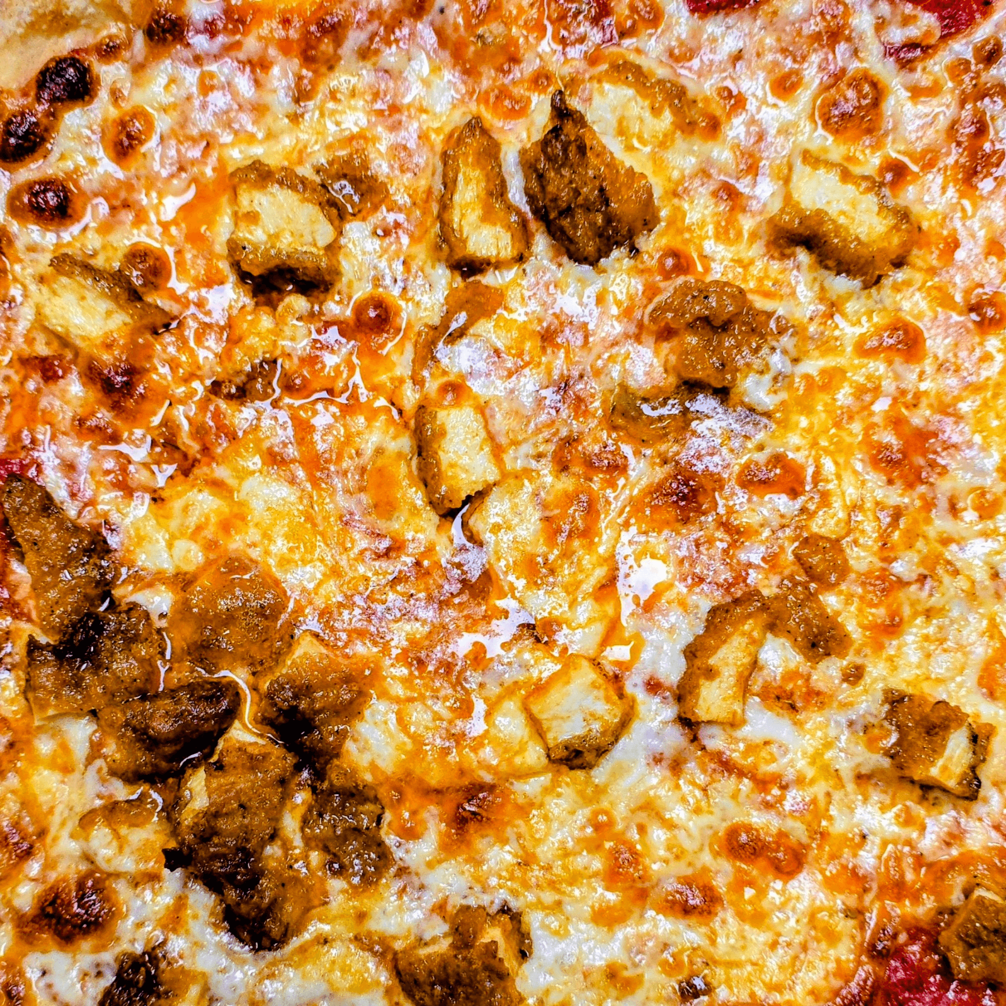 MEDIUM CHICKEN PARM PIZZA.