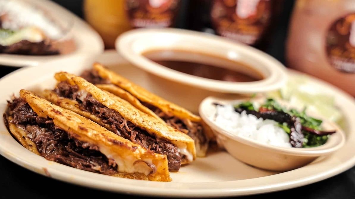 3 Quesabirrias Y Consomé / 3 Quesabirrias and Broth for Dip.