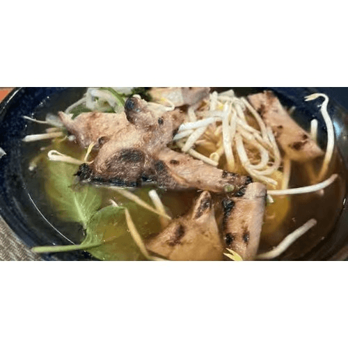 Pho Suon Nuong/Grilled Pork Chop Rice Noodle Soup.