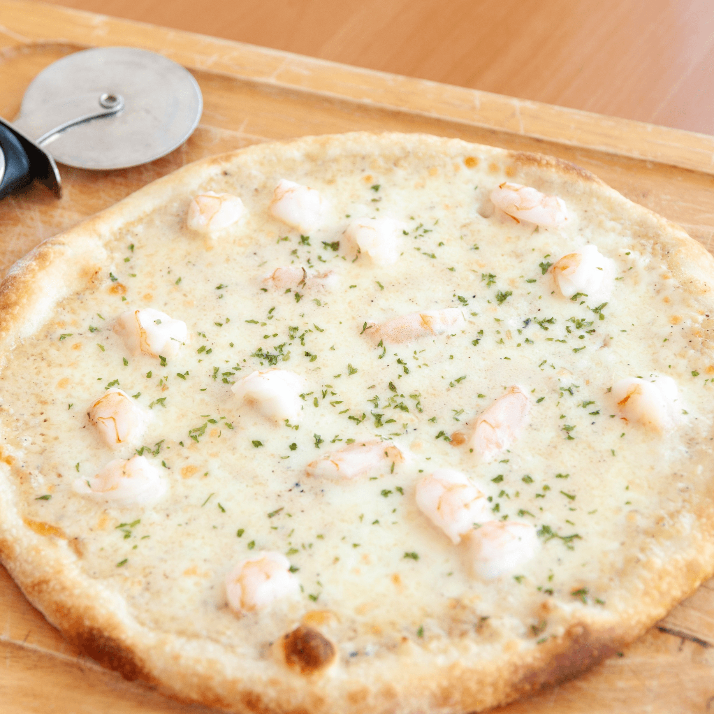 Shrimp Alfredo Pizza.