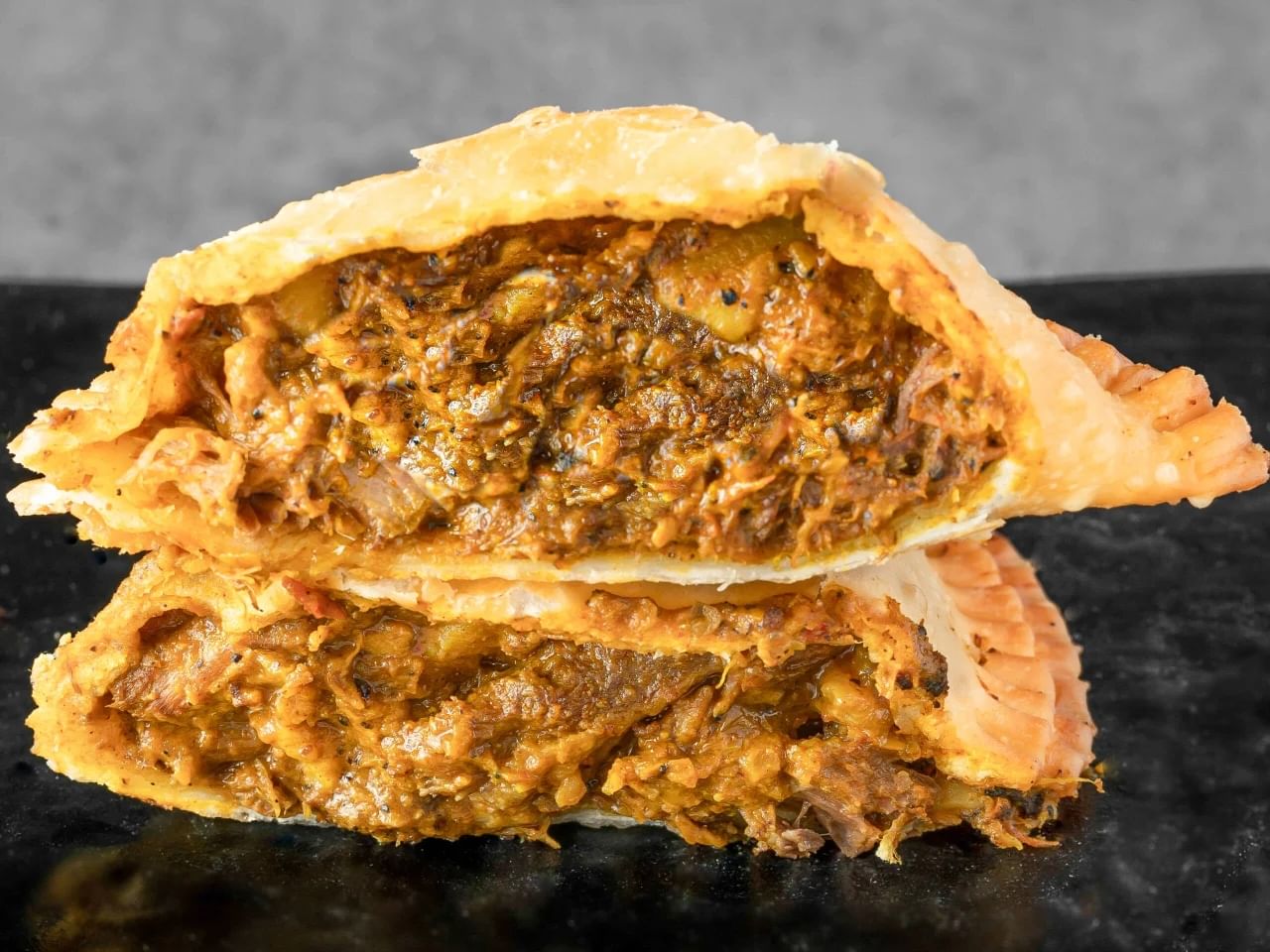 Curry Goat Empanada.