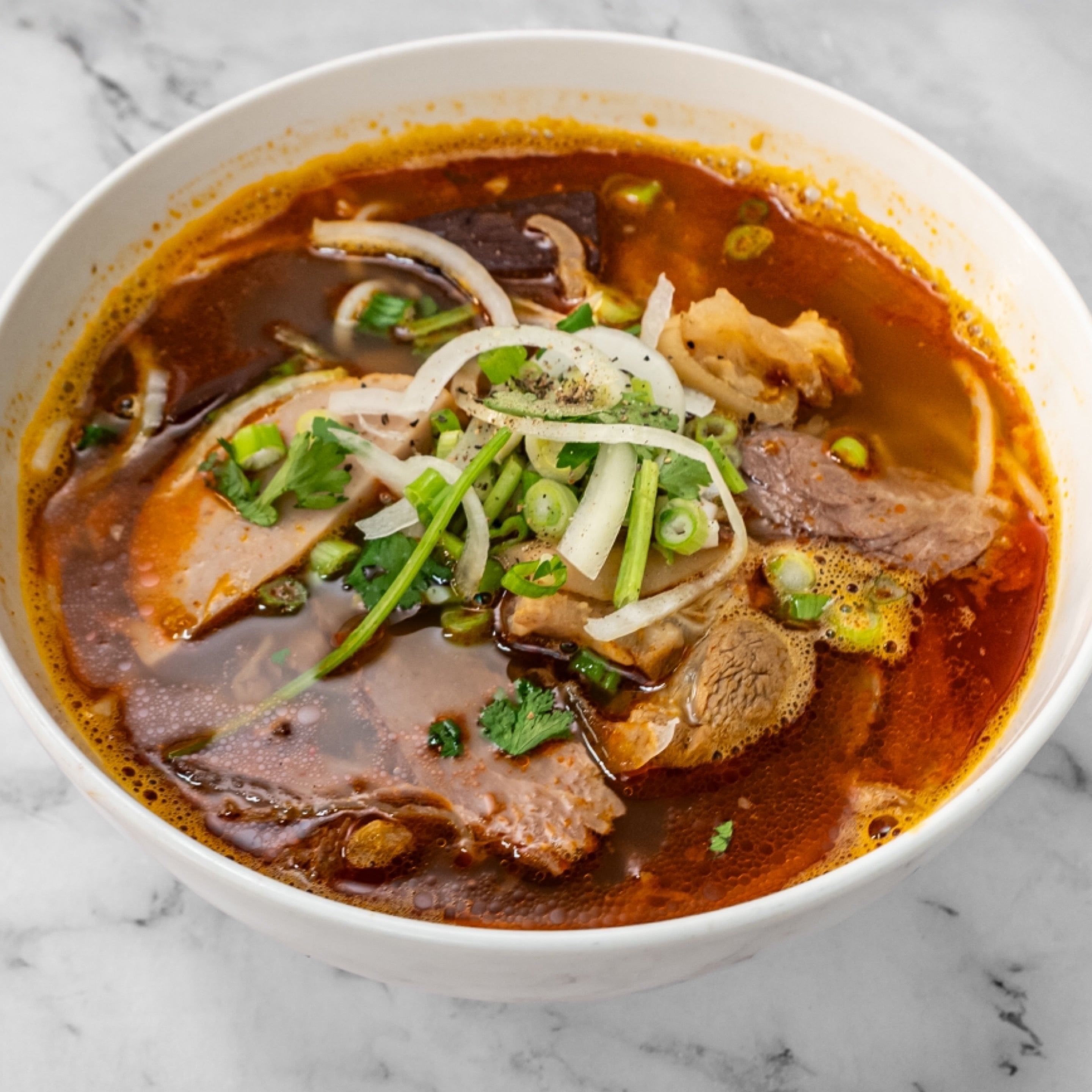P2. Bun Bo Hue (Spicy Beef Noodles).