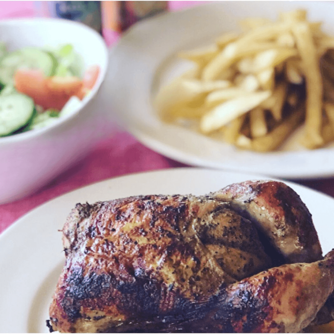 Whole Rotisserie Chicken with two sides.