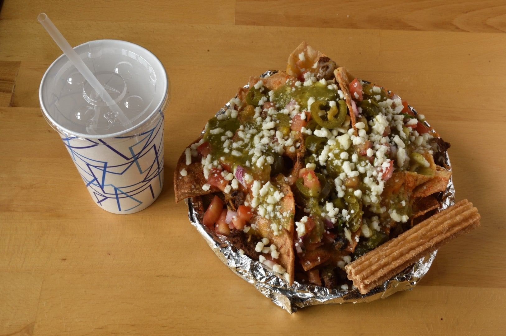 Lunch Specials - Carne Asada Nacho Lunch And 8" Churro.