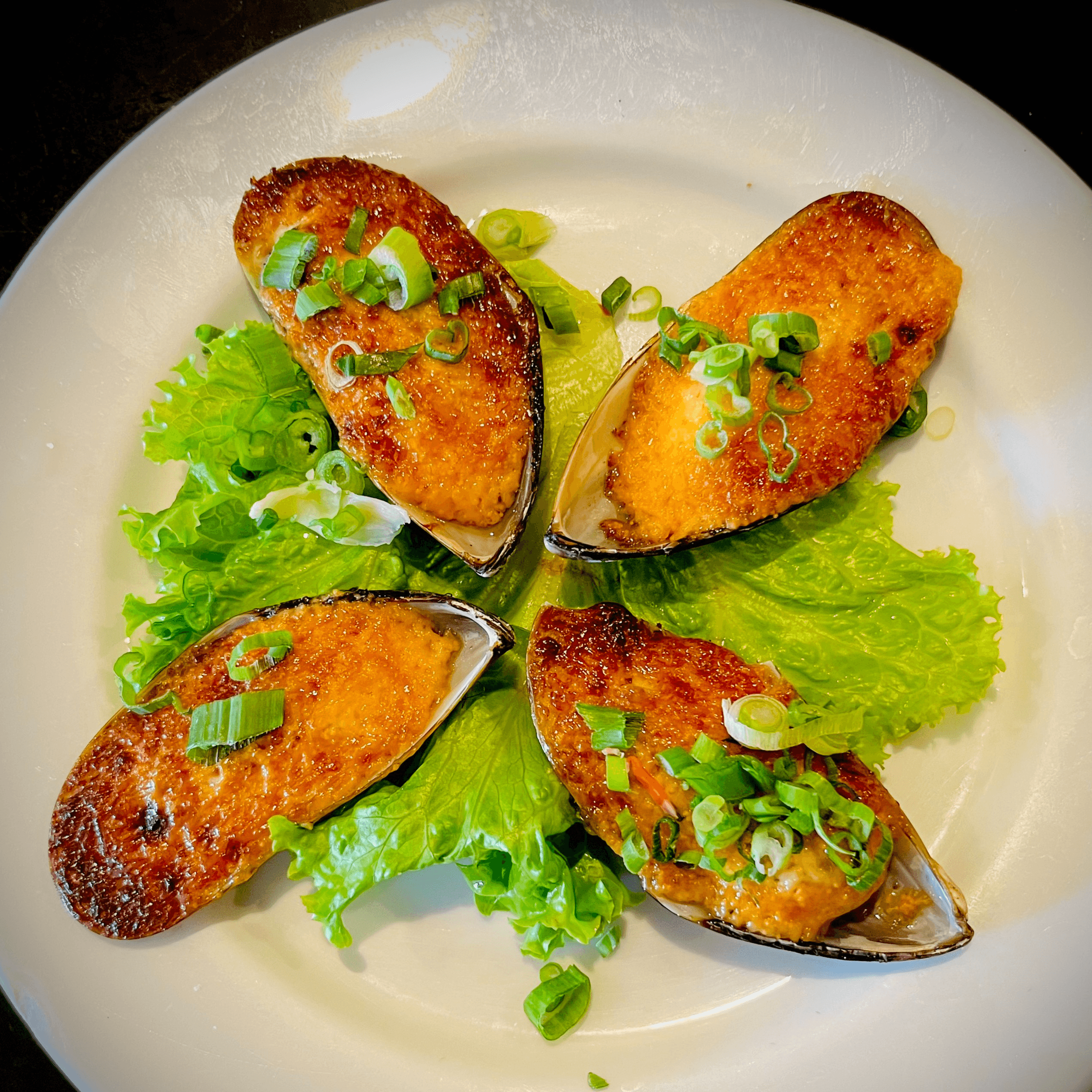26. Spicy Baked Green Mussels.