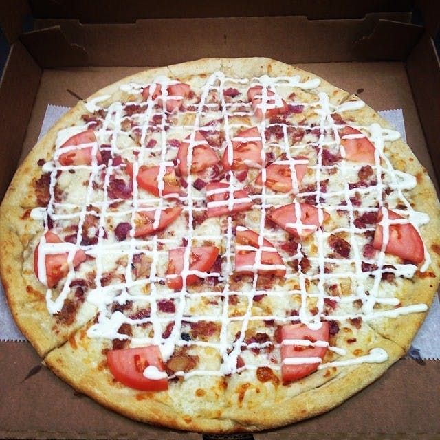 Tomato bacon ranch pizza.