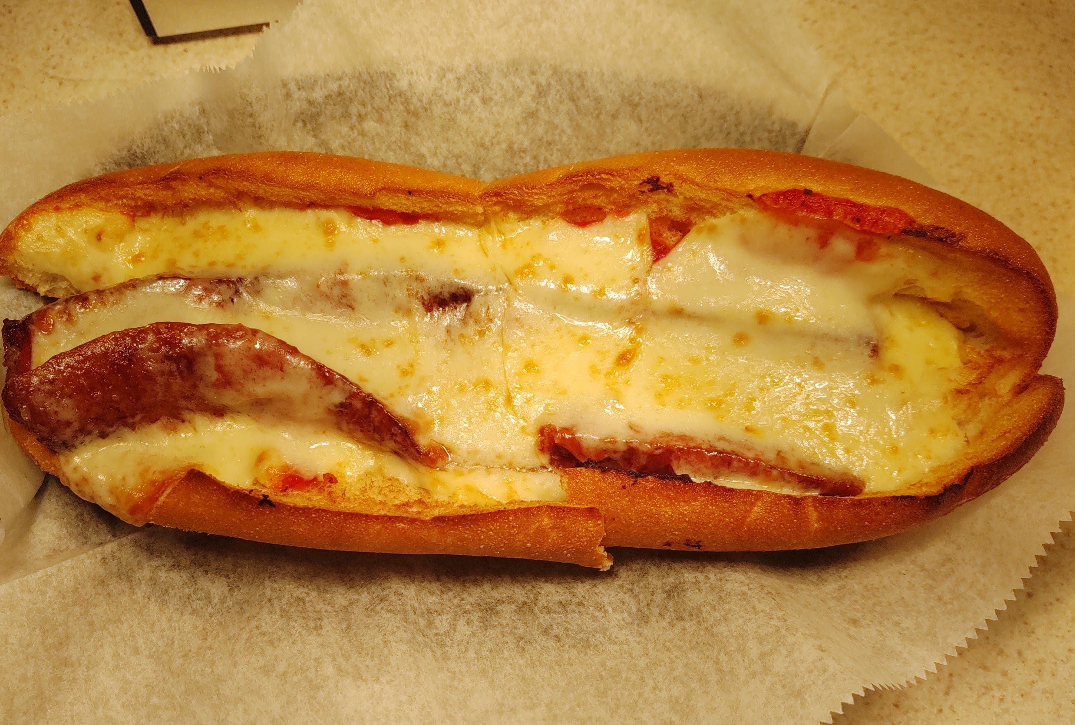 Sweet Italian Sausage Parmigiana Sub.