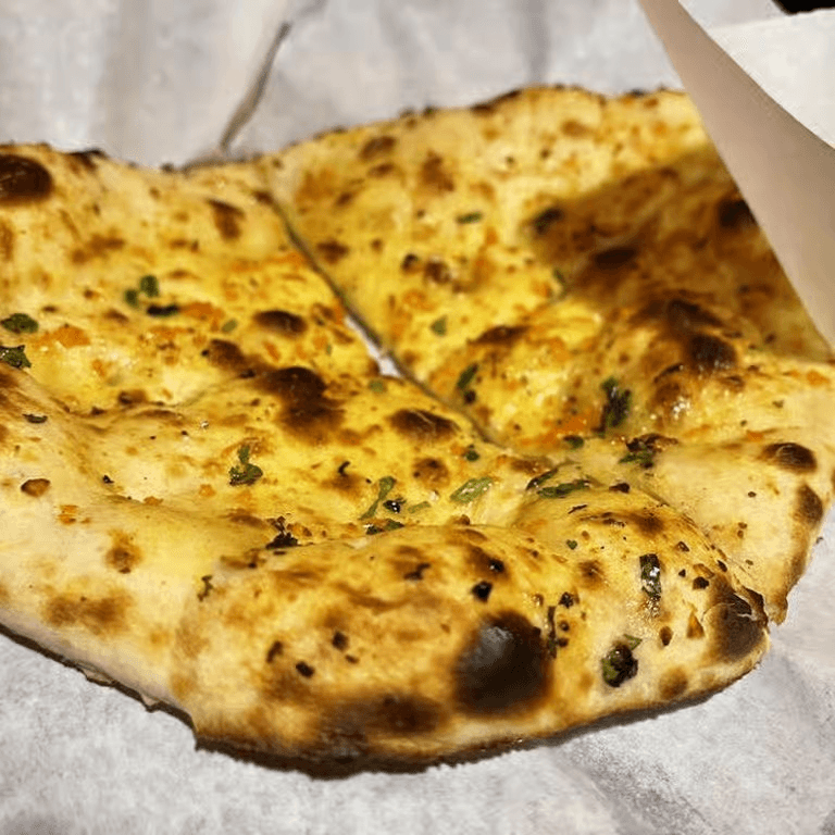 80. Chicken Garlic Naan.