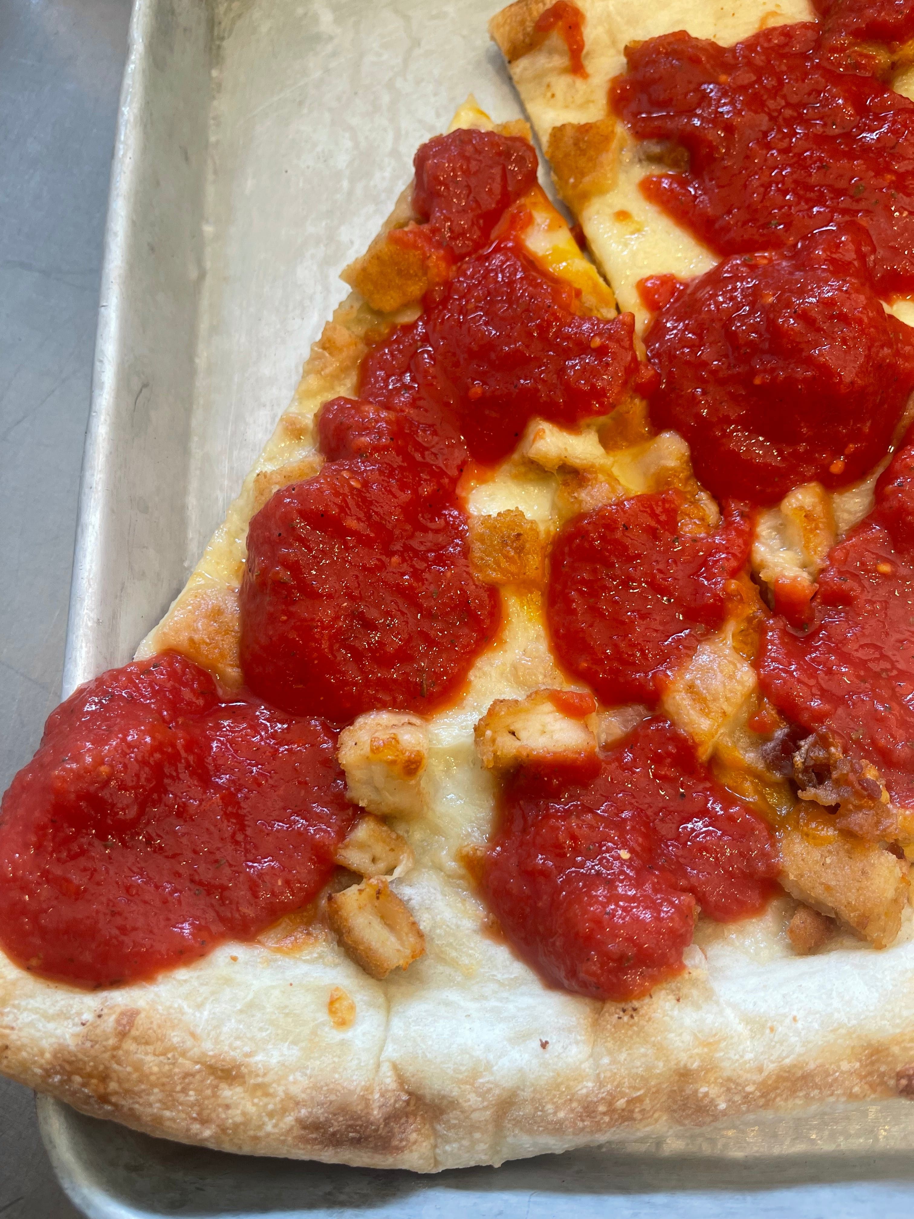 Chicken Parm Pizza Slice.