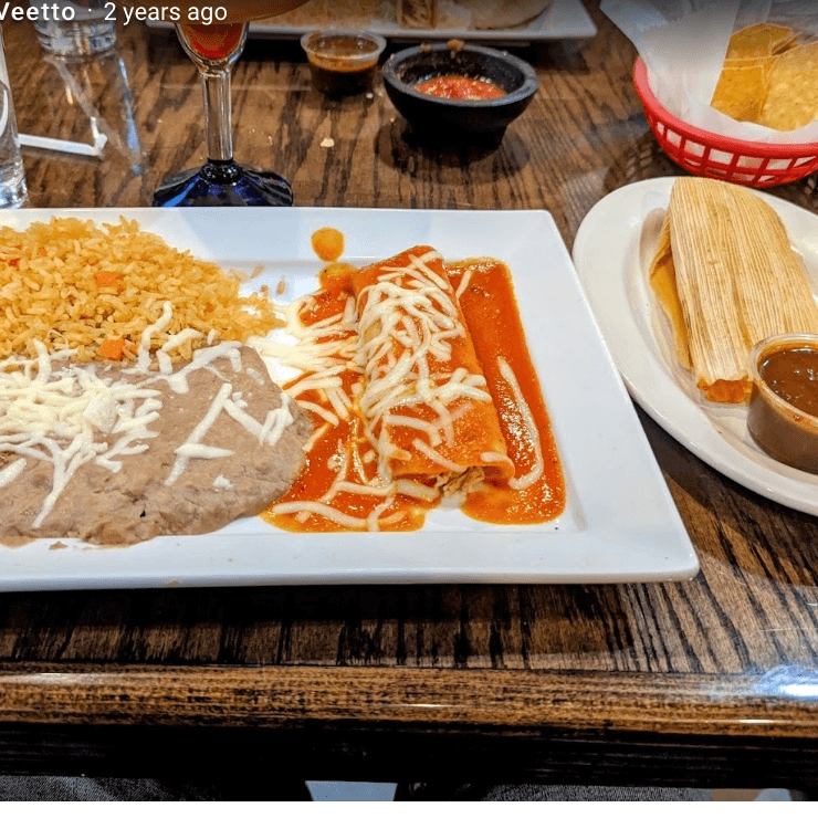 One Enchilada, One Tamale, Rice & Beans.