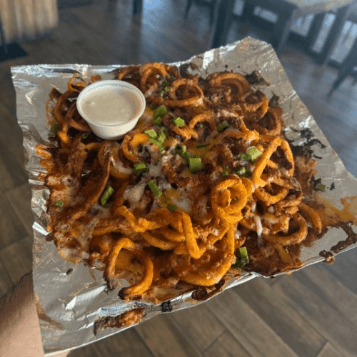 Loaded Oven-Baked Seasoned Curly Fries.