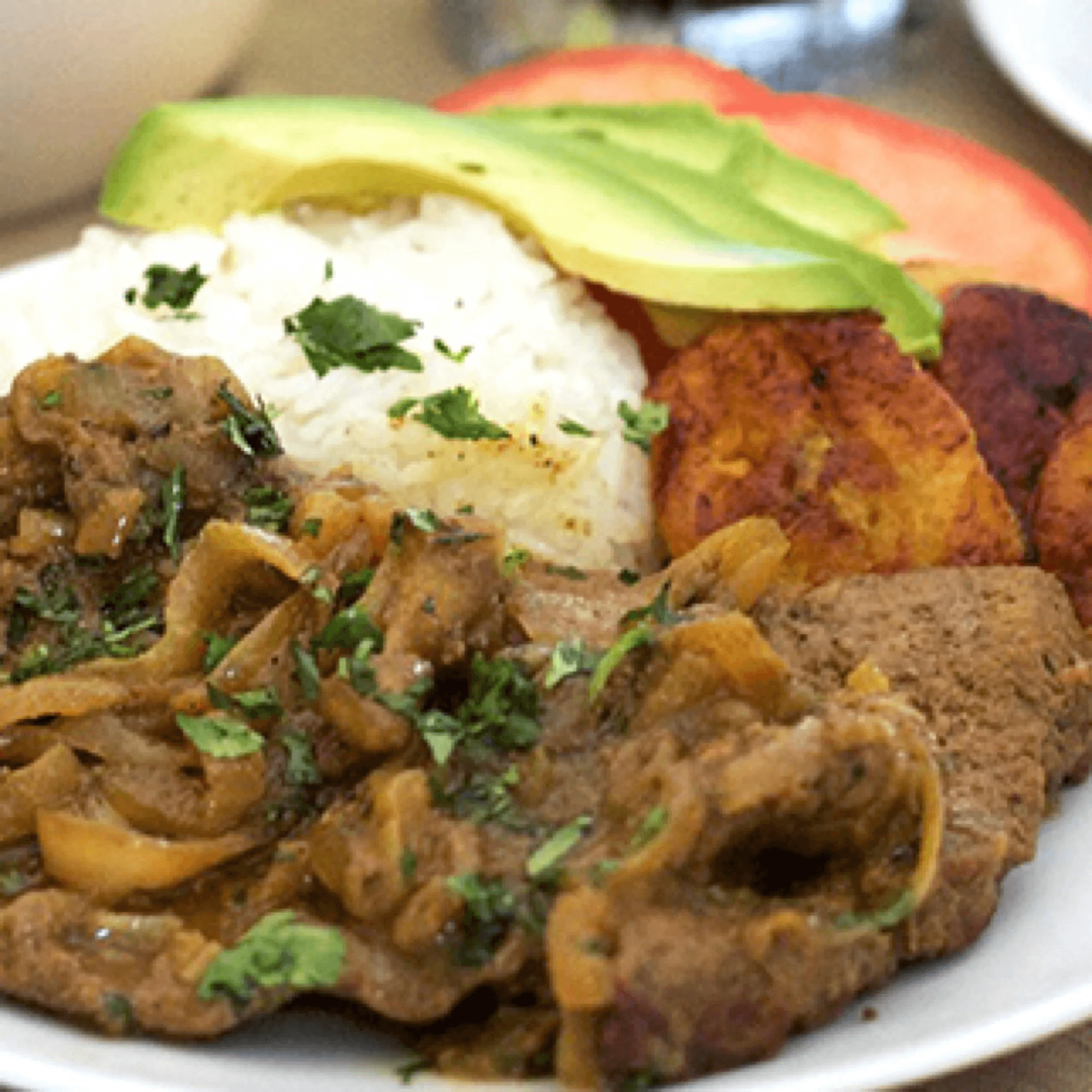 Bistec Encebollado.