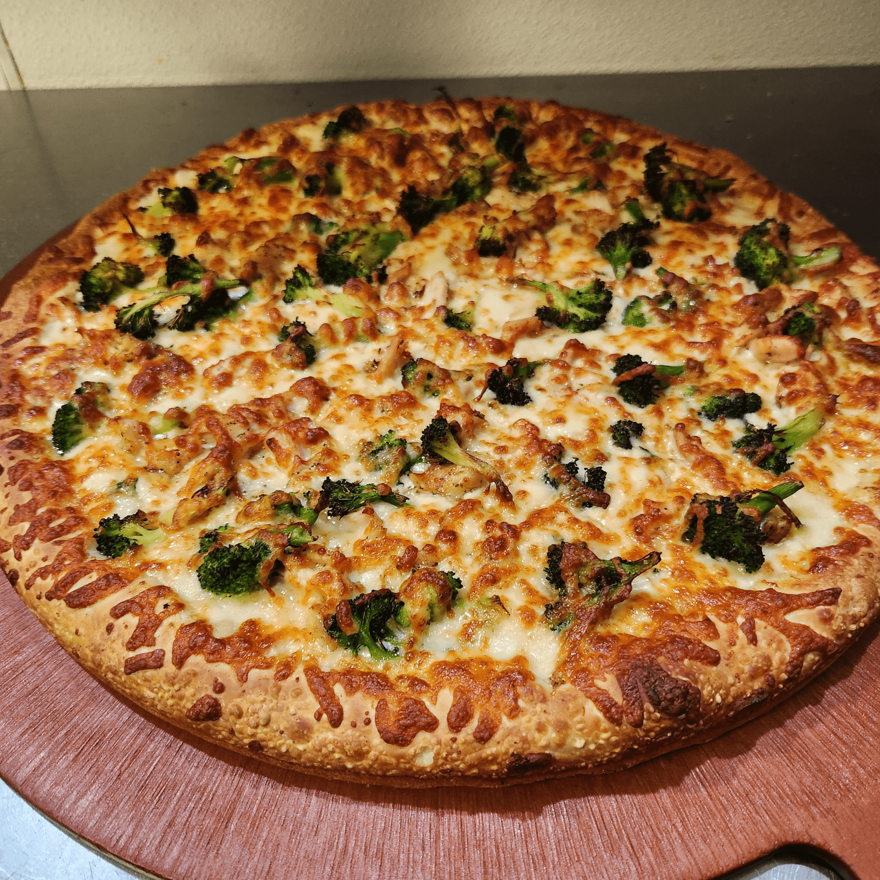  Chicken Broccli Alfrefo Pizza.