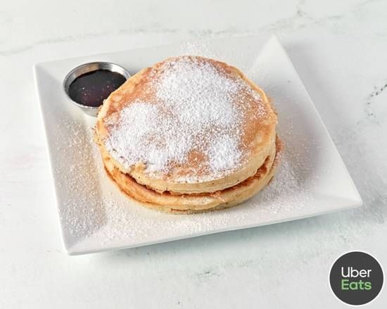 PLAIN PANCAKES SYRUP AND POWDER SUGAR.