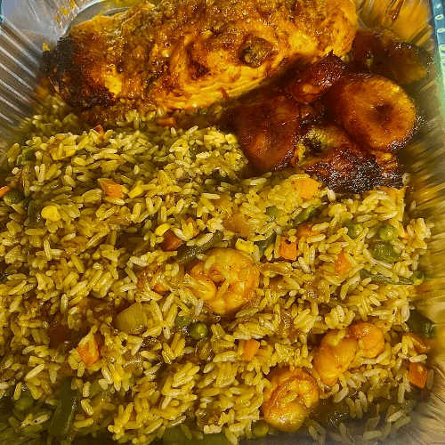 Jollof Rice With Fried Salmon.