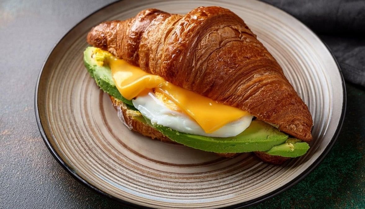 Avocado, Egg & Cheese Sandwich Croissant.