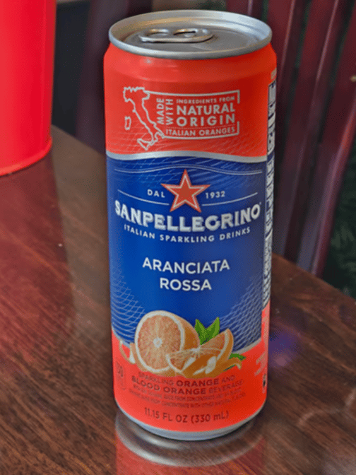 Can of San Pellegrino.