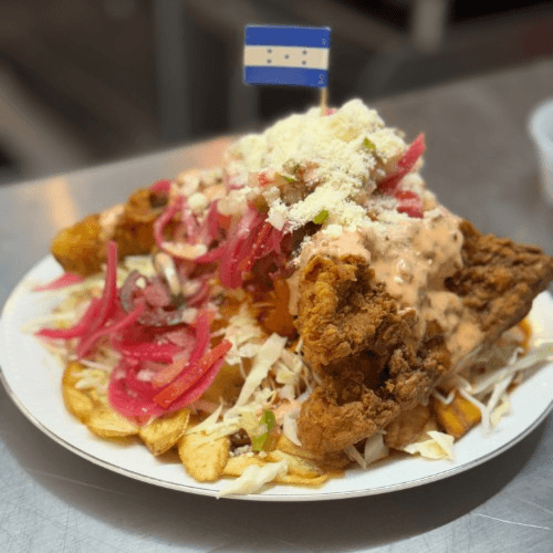 Pollo Frito Con Tajadas/Fried Chicken with green bananas.