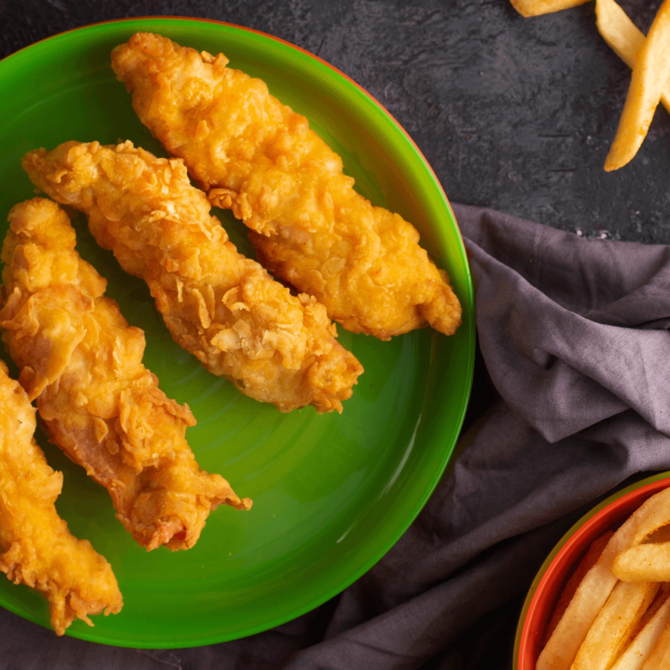 Kids Four Chicken Fingers with Fries.