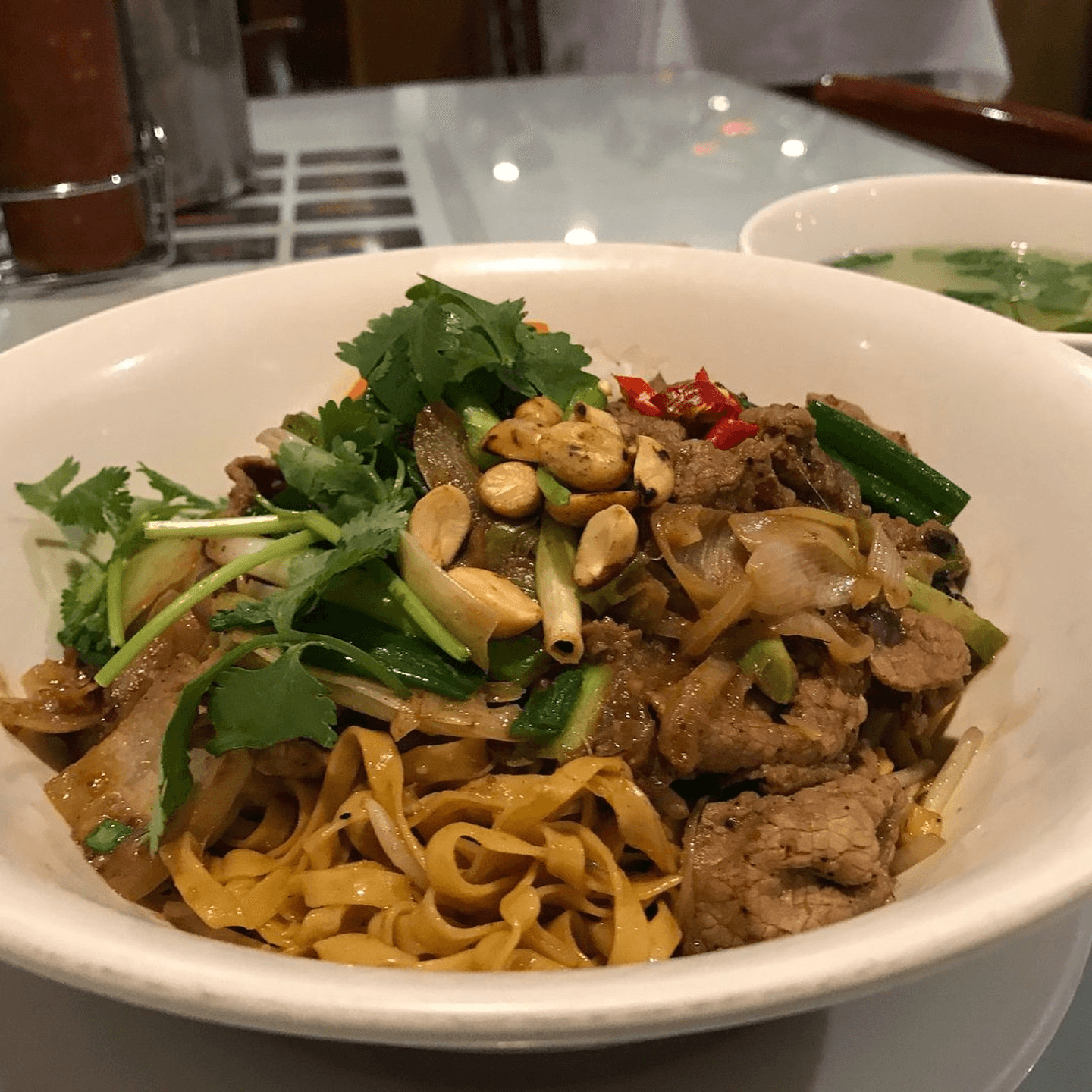 Spicy Bliss in Beef Sautéed with Flat Egg Noodles 