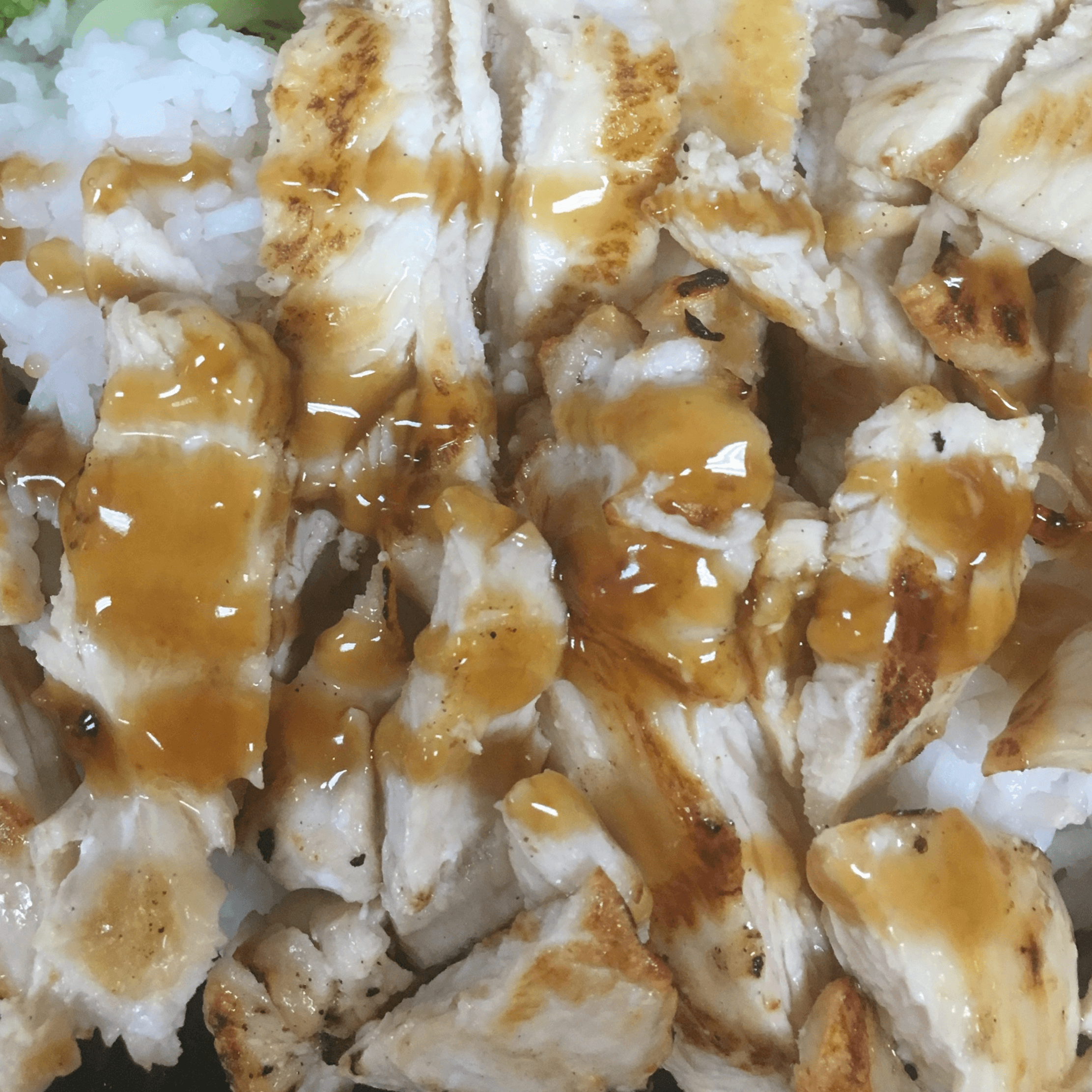 White chicken teriyaki rice meal.