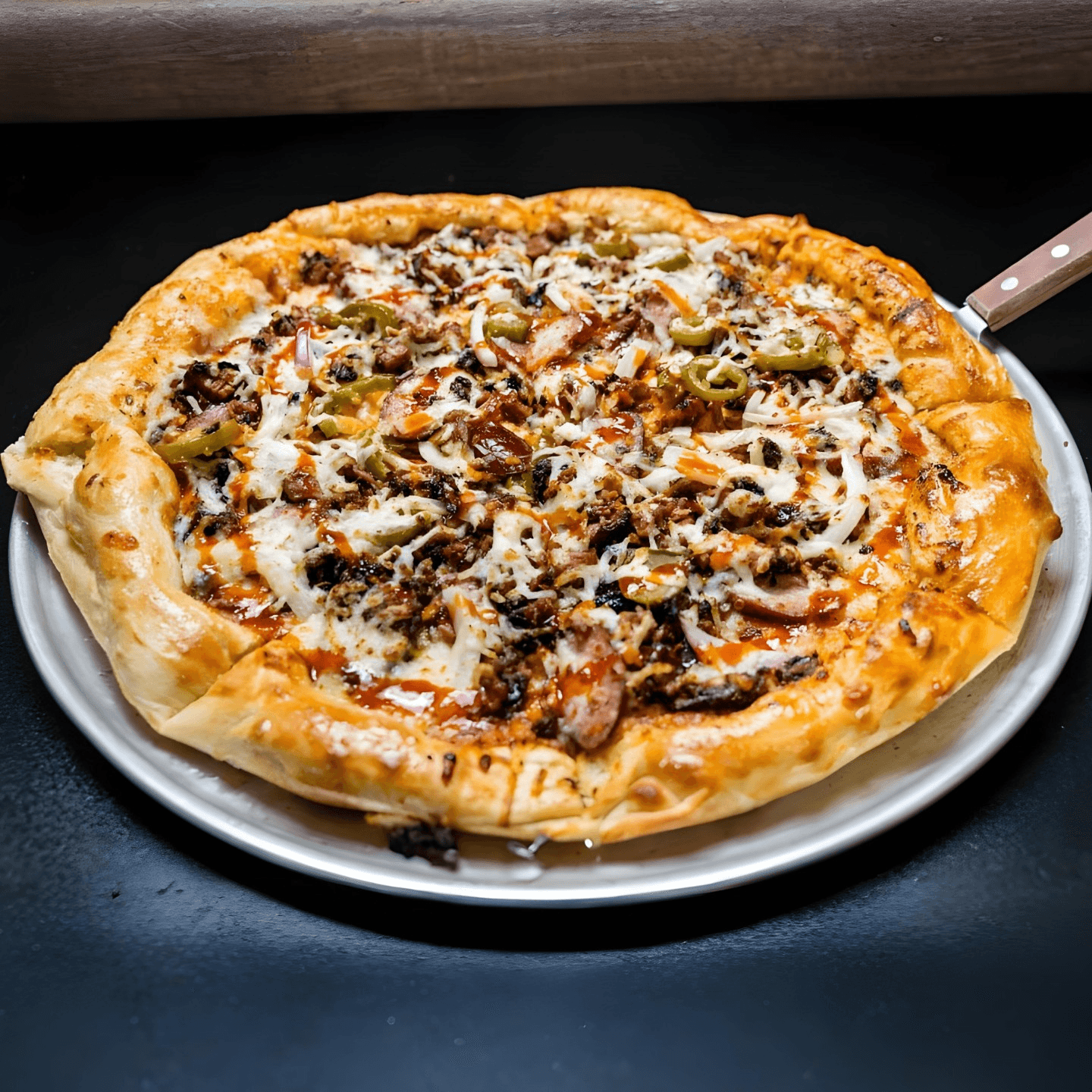 Home of the Original BBQ Pizza