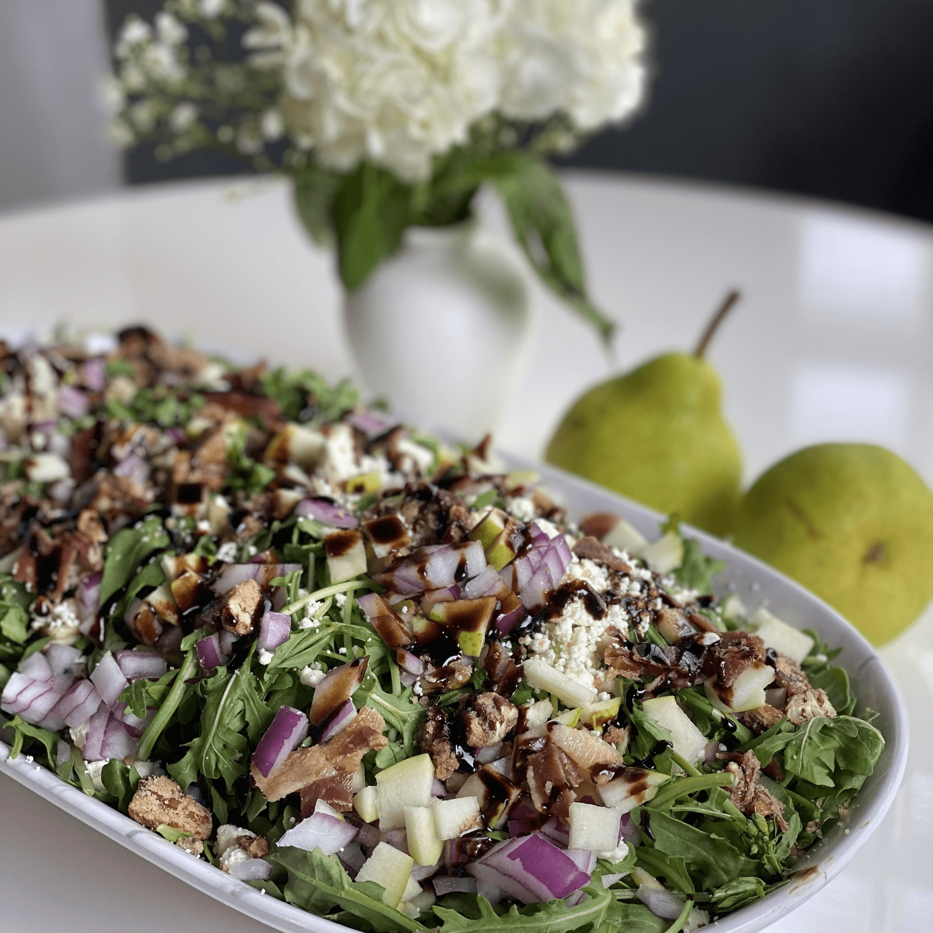 PROSCIUTTO + PEAR ARUGULA SALAD.