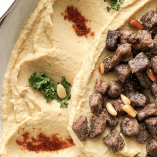 Hummus topped with Beef 