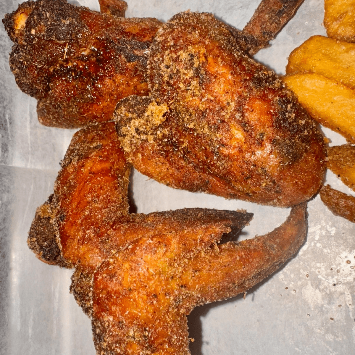 Whole Smoked & Dry Rubbed Wings & Fries.