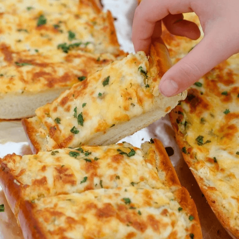 Cheese Garlic Bread with Marinara Sauce.
